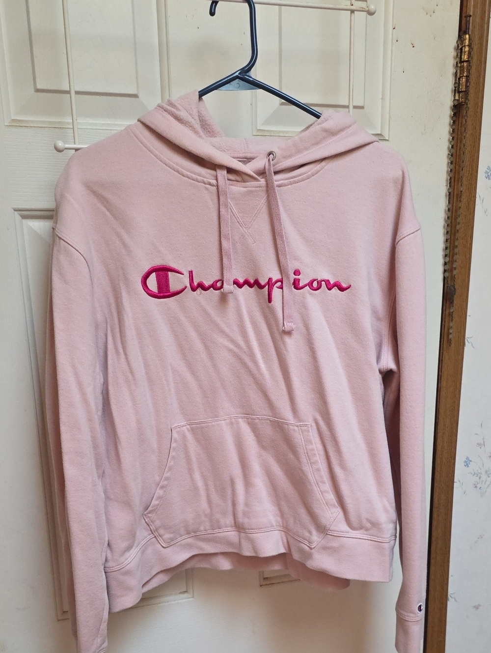 Champion Women’s Light Pink Pullover Hoodie with Magenta Script Logo